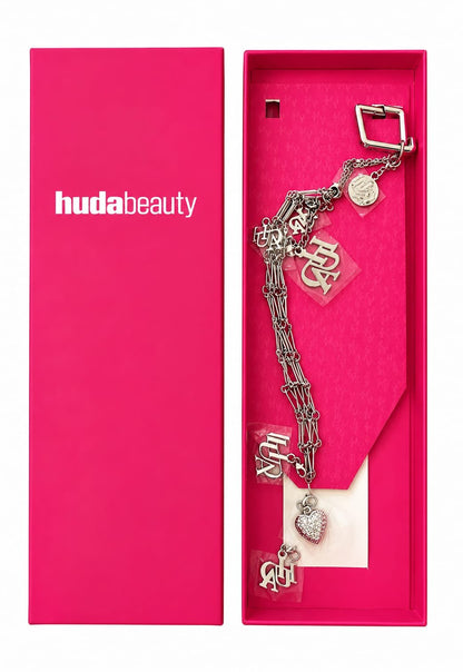 Huda Beauty TRAVEL SPRAY FRAGRANCE HOLDER WITH CHARMS